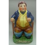 A Staffordshire style figure of Daniel L