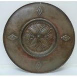 An Art Nouveau plaque, a/f, diameter 43c