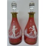 A pair of cranberry glass Mary Gregory s