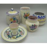 Five pieces of Poole pottery including t