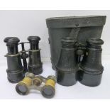 Three pairs of binoculars including one