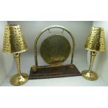 A brass table gong and a pair of modern