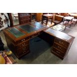 A mahogany and burr walnut corner desk
