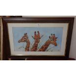 A Jonathan Truss print of giraffes, fram