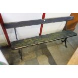 A cast iron platform bench