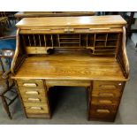 An oak roll-top desk