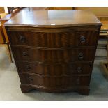 A reproduction mahogany serpentine chest