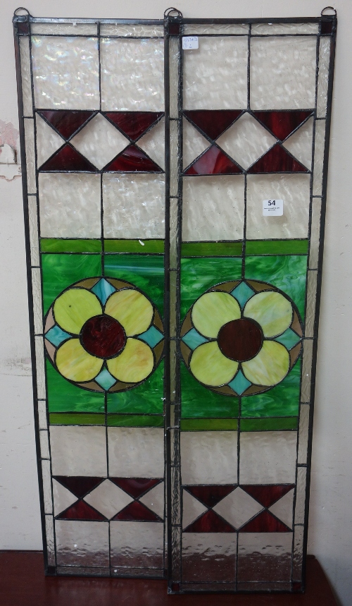 A pair of stained glass panels