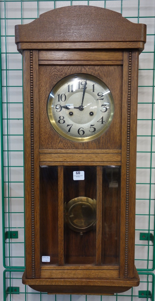 An oak wall clock