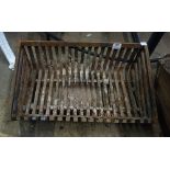 A cast iron fire grate