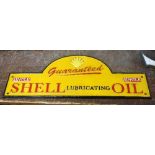 A reproduction Shell Oil metal sign