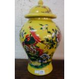 A reproduction Chinese Imperial yellow ground vase and cover