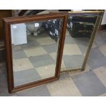 A gilt framed mirror and a mahogany framed mirror