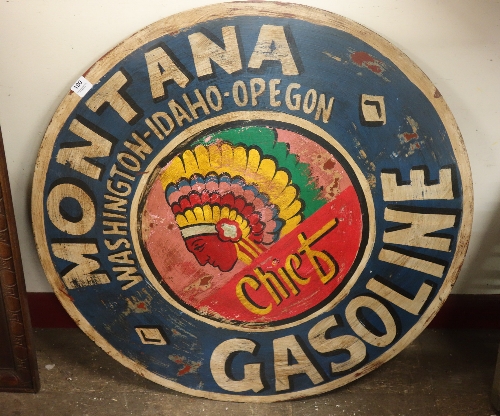 A Montana Gasoline painted metal circular advertising sign