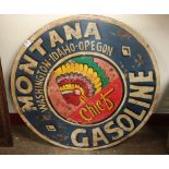 A Montana Gasoline painted metal circular advertising sign