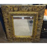 A gilt framed mirror