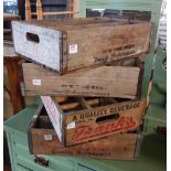 A set of four wooden advertising crates