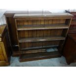 A pair of Victorian mahogany open bookcases
