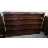 A Victorian stained pine open bookcase