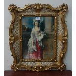 A portrait print of a lady, framed
