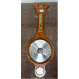 A reproduction banjo barometer