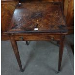 An Edward VII rosewood and marquetry inlaid envelope card table
