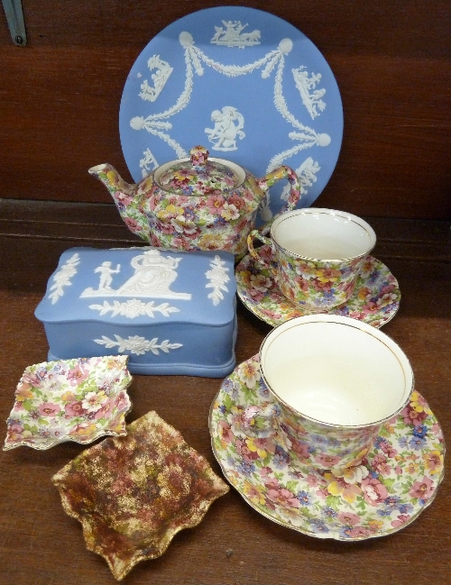 A James Kent Du Barry chintz ware teapot and two cups and saucers, and a Wedgwood Jasperware plate,