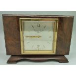 A walnut cased Garrard & Co. Ltd. by Elliott mantel timepiece, top bears presentation plaque,