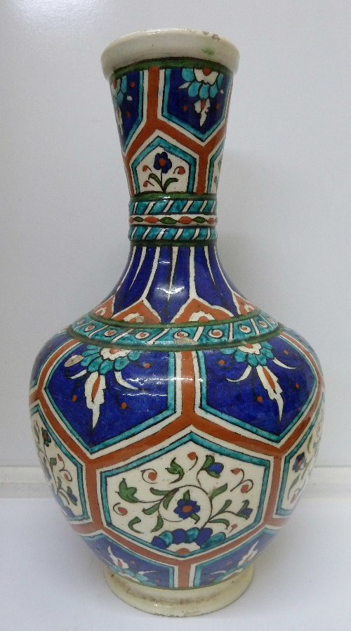 A floral decorated vase, height 31cm