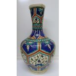 A floral decorated vase, height 31cm