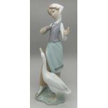 A Lladro figure, E-16N stamp to base, height 24cm