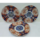 Three Meiji period plates, diameter 21cm