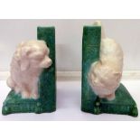 A pair of Bretby cat and dog bookends, two small chips to cat