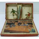 A blow football game with tin plate figures, boxed