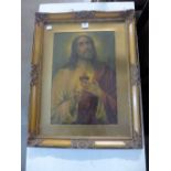 A religious print of Jesus Christ, framed