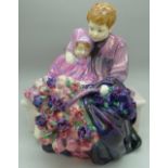 A Royal Doulton figure, The Flower Seller's Children, HN1206, small chips to flower petals