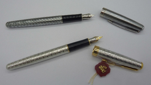 Two Parker Sonnet pens, both with 18ct gold nibs, unused