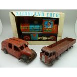 A tin plate Fairyland battery operated locomotive, a Tri-ang Minic Fire Tender, a/f, and a Dinky