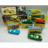 A Dinky Toys Speedwheels 223 McLaren M8A CanAm, a Budgie Routemaster Bus, a Corgi Toys 337