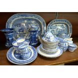 Blue and white china including Willow pattern meat plates, a pair of Wedgwood vases, one a/f,