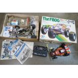 A Tamiya The Frog 1/10th scale remote control racer, boxed and one other remote control car