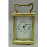 A brass carriage timepiece, dial a/f, height 11cm