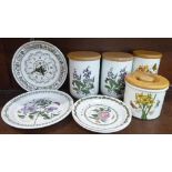 Two Royal Worcester storage jars, two Portmeirion Botanic storage jars, three plates, and a wall