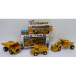 Five die-cast vehicles including Ertl and Joal