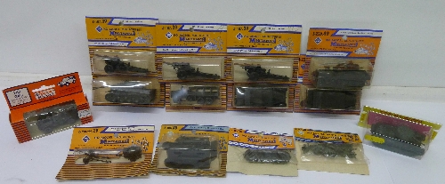 Fourteen Minitanks HO model miniature tanks and vehicles