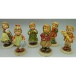 Six Hummel figures