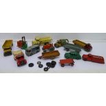 A collection of thirteen Dinky Toys model vehicles and trailers