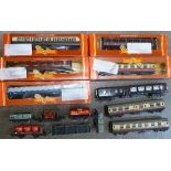 Eight Hornby model railway carriages, five boxed, and six wagons