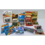 Die cast vehicles including Matchbox, Majorette and Corgi, all packaged