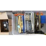 A collection of model rail, mainly railway buildings, scenery, two transformers and track, etc.